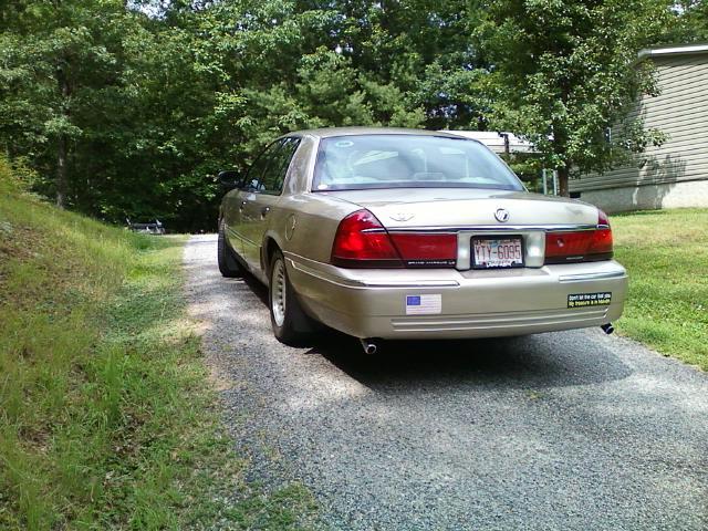 Gold 2000 Mercury Grand Marquis rear view with license plate KTY-6095