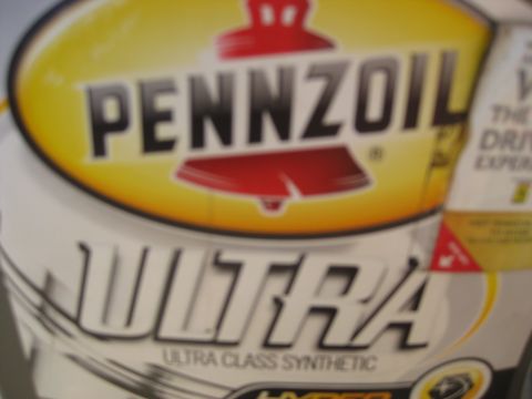 2003 Ford Crown Victoria - Close-up of a Pennzoil Ultra oil container, the brand logo and product name.