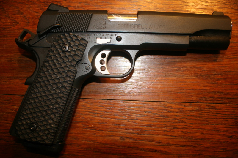 Springfield Armory pistol on a wooden surface