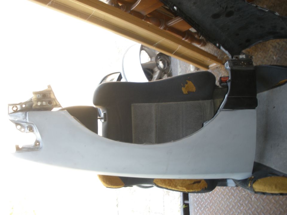 Gray car fender and seat interior