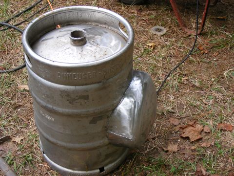 1978 Ford Bronco - A beer keg has been modified with a chrome bumper attached to its exterior.