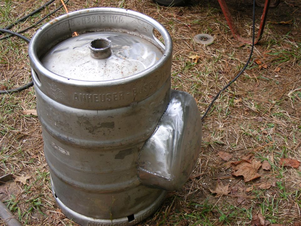Beer keg with a chrome bumper welded to its side