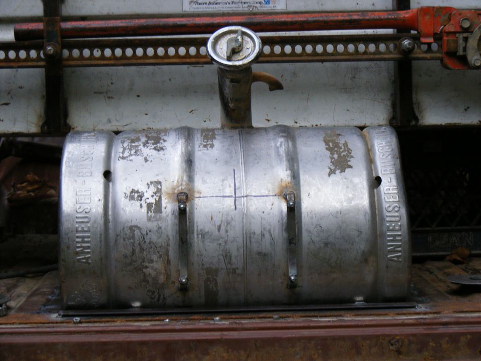 Anheuser-Busch beer keg converted to a fuel tank, mounted in a vehicle bed