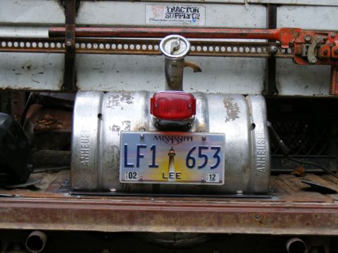 1978 Ford Bronco - This custom build features a keg repurposed as a fuel tank, complete with a Mississippi license plate.