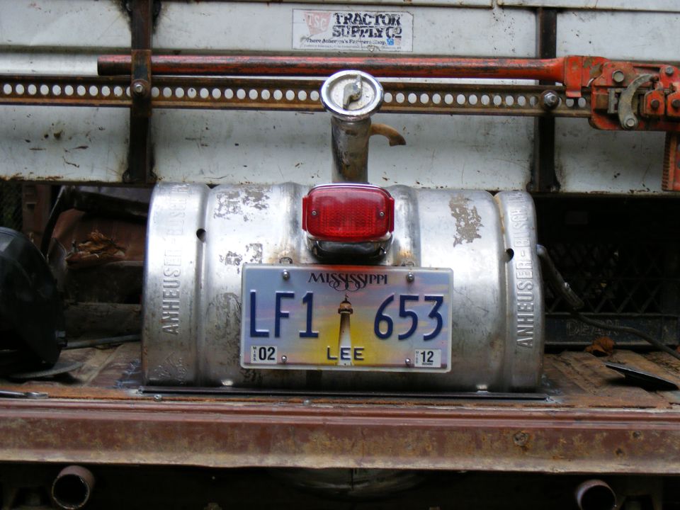 Rear view of custom vehicle with keg fuel tank and Mississippi license plate LF1 653