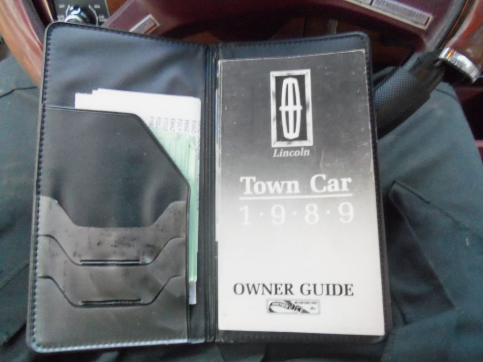 Photo of a 1989 Lincoln Town Car Owner Guide booklet in its case