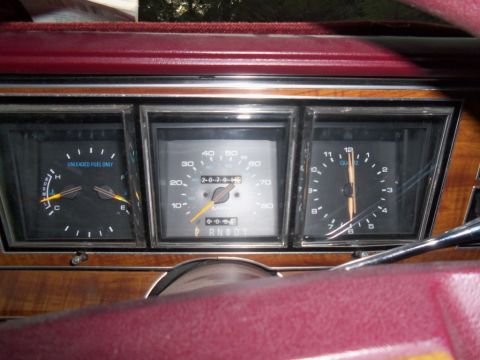 2000 Mercury Grand Marquis - Dashboard gauges including fuel, speedometer, and clock. Odometer reads 203,745 miles.