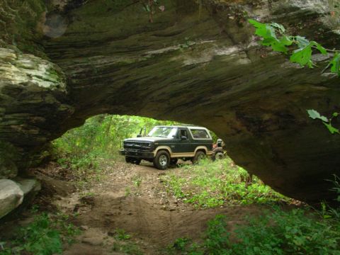 1983 Ford Bronco - The trail forks just out-of-frame to the R so you can drive to either side, but a truck won't fit under the arch. Those are 4-wheeler track…