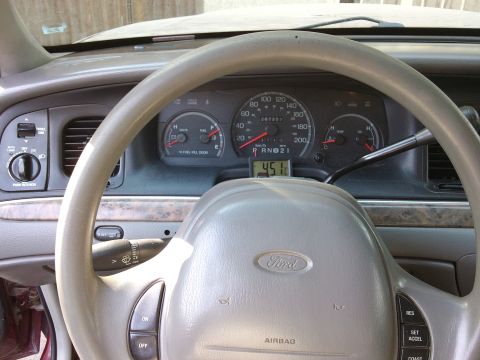 1998 Ford Crown Victoria - The dashboard of a 1998 Ford Crown Victoria displays the fuel efficiency reading.