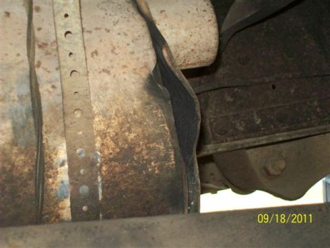 1979 Ford F-150 - Close-up view of the undercarriage, showing frame components and exhaust system.
