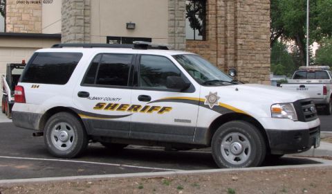2006 Ford F-150 - Albany County Sheriff SUV, a 2006 model, is parked outside a stone building with another Sheriff vehicle in the background.