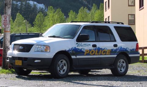2006 Ford F-150 - Whittier police SUV parked outdoors with trees and buildings in the background.