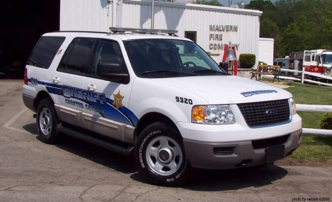 2006 Ford F-150 - A white Ford Expedition SUV, marked for the Sheriff's department, is parked outside the Malvern Fire Company building.