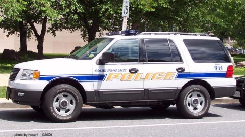 2006 Ford F-150 - A white police SUV, identified as belonging to Boiling Spring Lakes, is parked on a street.