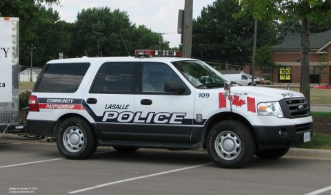 2006 Ford F-150 - This LaSalle Police SUV is marked with 'Community Partnership' and Canadian flags, indicating its service area.