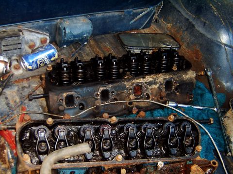 1982 Ford Bronco - Close-up view of engine valve train components, with a blue beverage can visible in the background.