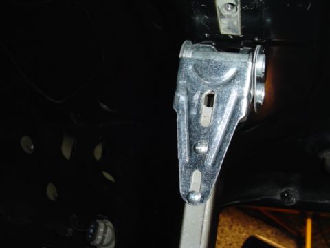 1999 Ford Taurus - Close-up view of a trunk latch mechanism, a Supermotors.net watermark.
