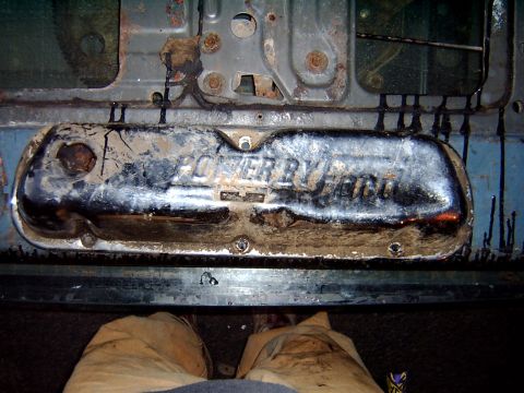 1982 Ford Bronco - A dirty engine valve cover reads "POWER BY FORD".