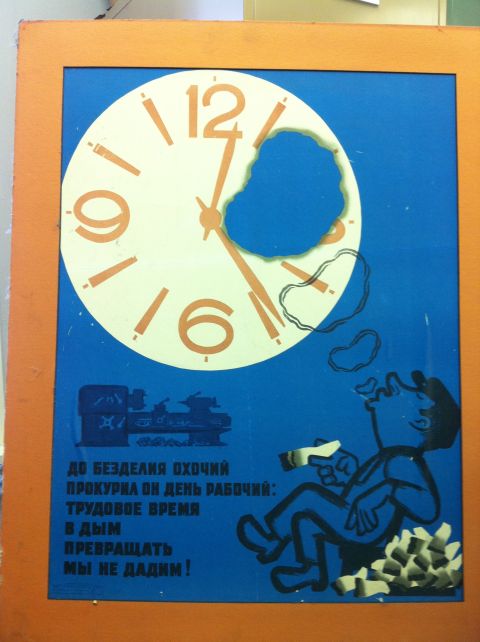 2007 Subaru Impreza - Poster with a clock face, a man smoking and blowing smoke rings, and Russian text below.