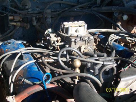 1979 Ford F-150 - Engine bay detail with carburetor and distributor visible, dated 09/19/2011.