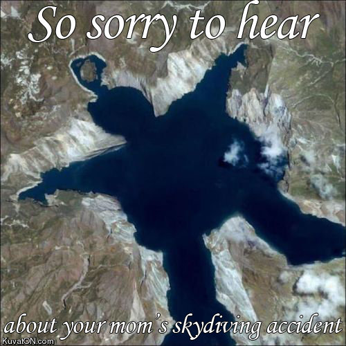 Skydiver in freefall over a dark lake and mountainous terrain. Text reads 'So sorry to hear about your mom's skydiving accident'