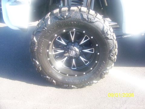 1989 Ford Bronco - A custom wheel and tire assembly is shown, with a date stamp of 09-01-2009 visible in the lower right corner.