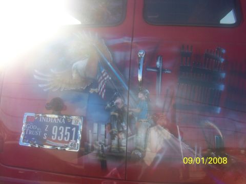 1989 Ford Bronco - This van features a patriotic mural with imagery related to 9/11 and an Indiana license plate.