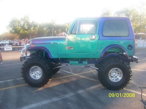 1989 Ford Bronco - Customized Jeep CJ-7 shows off its lifted suspension and unique paint job. The photo was taken on September 1, 2008.