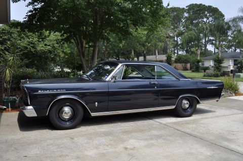 1965 Ford Galaxie - This 1965 Ford Galaxie 500 coupe is seen from the side, with its distinctive badging clearly visible.