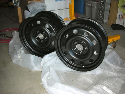 2004 Ford Crown Victoria - New black steel wheels ready for installation.