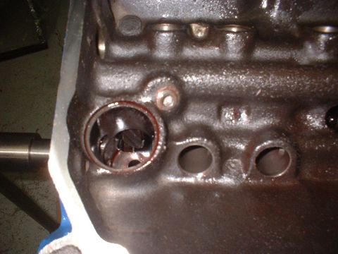 1969 Ford Mustang - Engine block detail showing a cylinder bore with oil residue.