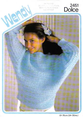 1988 Ford Bronco - Knitting pattern for Wendy Dolce sweater shows a woman with a light blue knitted sweater.