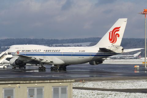 1988 Ford Bronco - Air China Cargo Boeing 747-400F B-2456 parked on a wet tarmac with snow in the background.