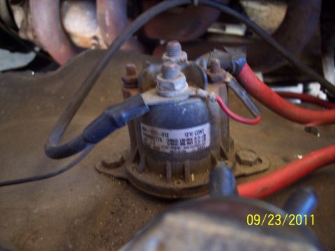 1973 Ford F-250 - Close-up of a starter solenoid with visible wiring and a date stamp of 09/23/2011.