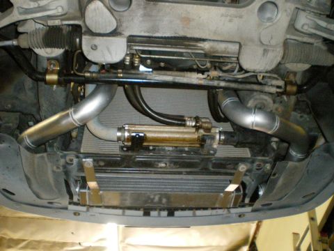 2004 Ford Crown Victoria - Custom supercharger system installed on the underbody of a vehicle, intercooler and polished piping.