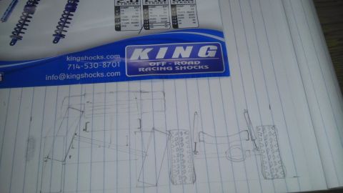 1989 Ford Bronco - Photo of a rough pencil suspension sketch on notebook paper, not a classifiable technical document.