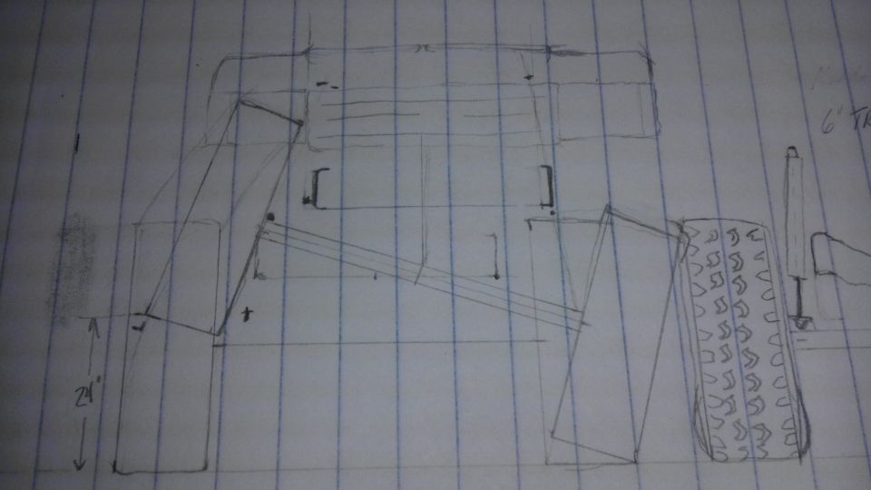 Photo of a rough pencil frame and suspension sketch on lined notebook paper