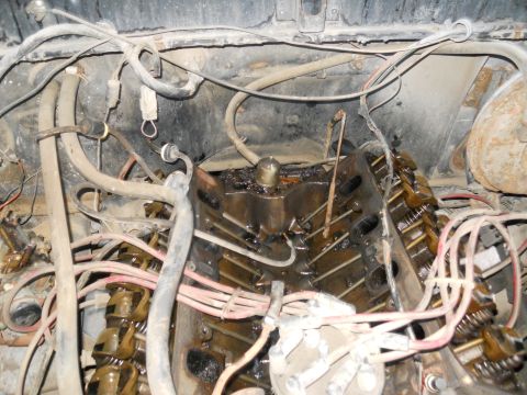 1979 Ford Bronco - Close-up view of a vehicle's engine bay, showing various components and wiring.