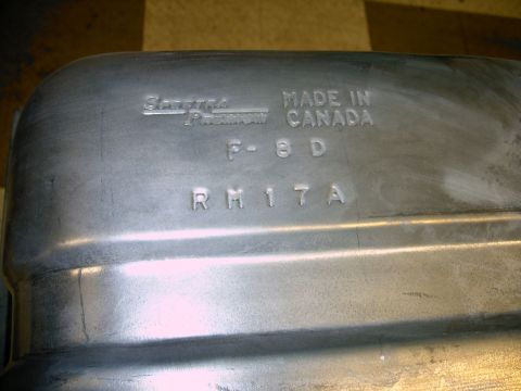 1990 Ford Bronco - Close-up of a Spectra Premium fuel tank, manufactured in Canada, showing part numbers.