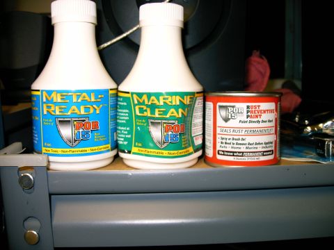 1990 Ford Bronco - Three POR-15 products are displayed on a shelf, including Metal-Ready, Marine Clean, and Rust Preventive Paint.