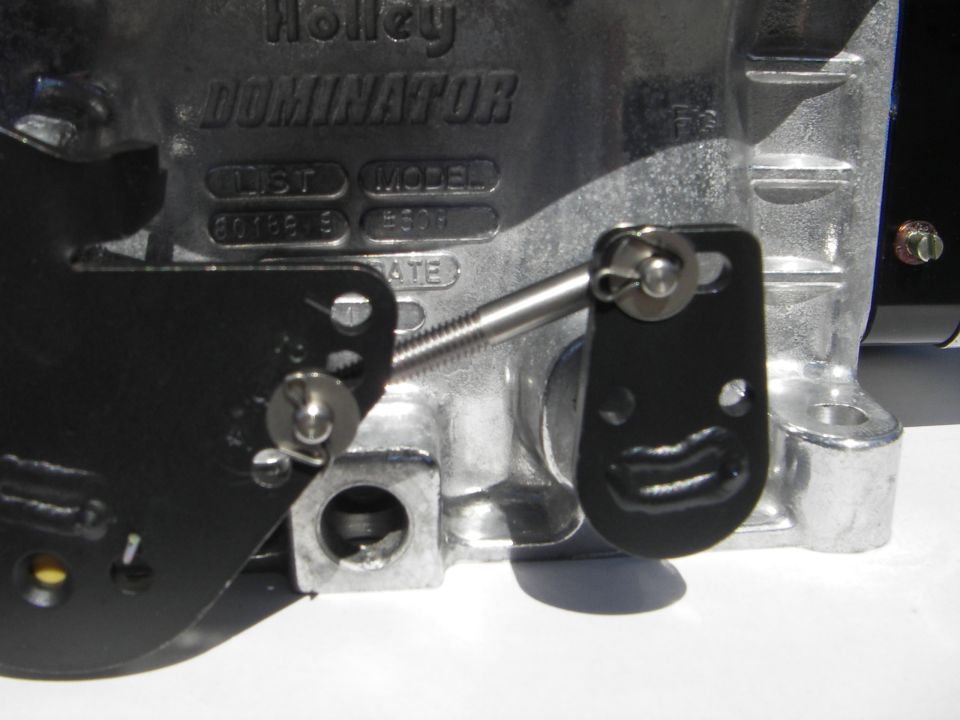 the new HP Dominators have an external linkage,
adjustable for secondary opening progression rate