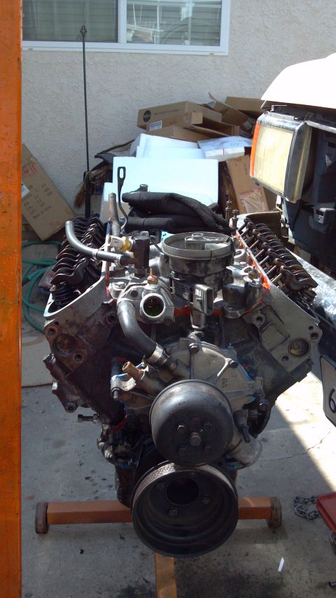 1990 Ford Bronco - Engine removed from vehicle and placed on an engine stand for service or repair.