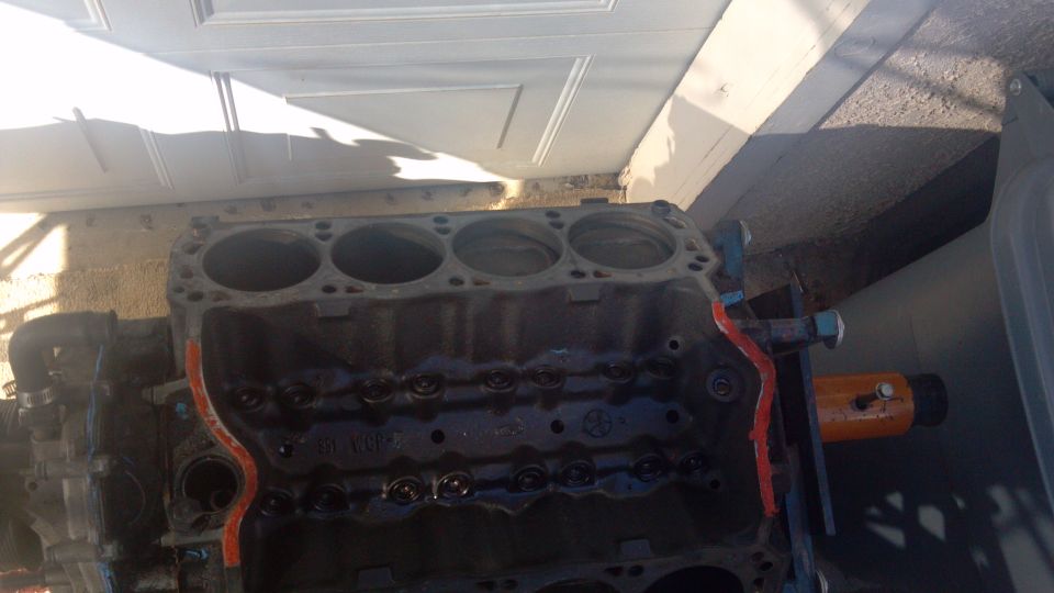 Engine block with orange support