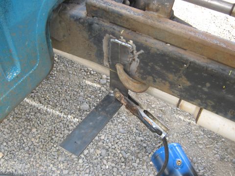 1972 Ford F-250 - Welding a new bracket onto the frame of a truck during a rebuild project.