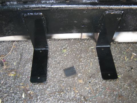 1972 Ford F-250 - Close-up view of black painted frame brackets, possibly part of a suspension or mounting system.