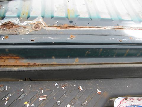 1992 Ford Bronco - Rust on rear, along line of rear and rear bed along spot weld line