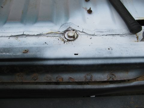 1992 Ford Bronco - Rust on rear, along line of rear and rear bed along spot weld line