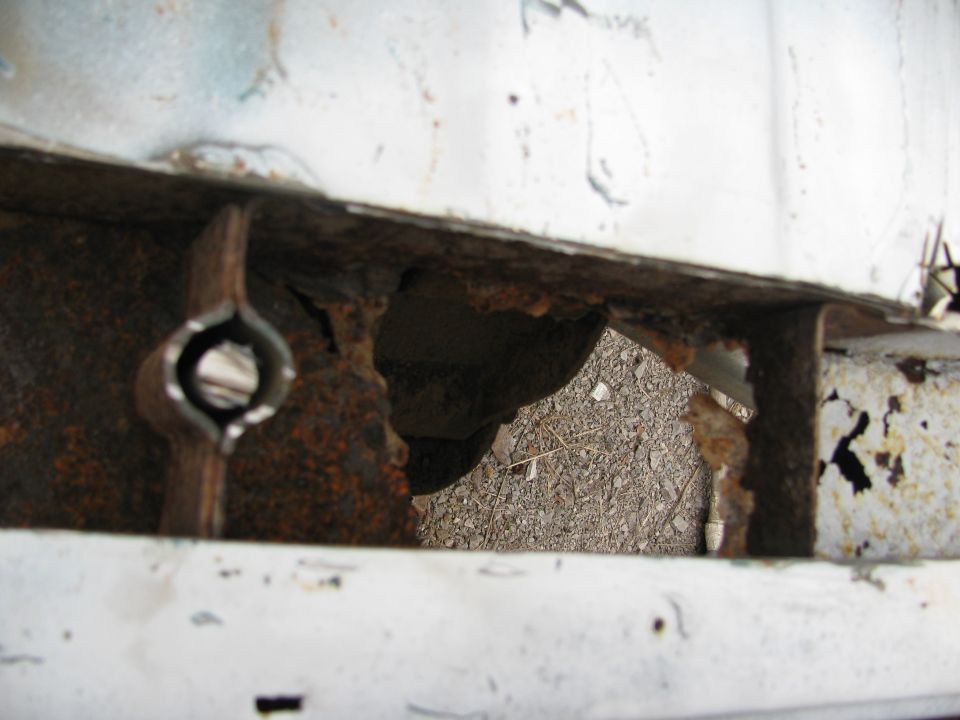 Cut off rear floor and tail panel with body bolt cut