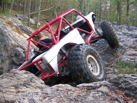 2001 Dodge 1500 - This off-road buggy navigates a difficult rocky terrain with its large tires.