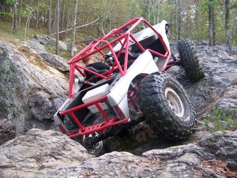 2001 Dodge 1500 - Custom off-road buggy navigates a rocky terrain.